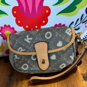 Vintage Dooney & Bourke wristlet with white heart charm